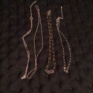 4 Gold colored necklaces